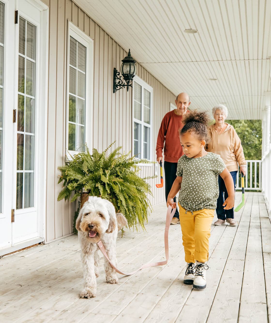 Child walking dog