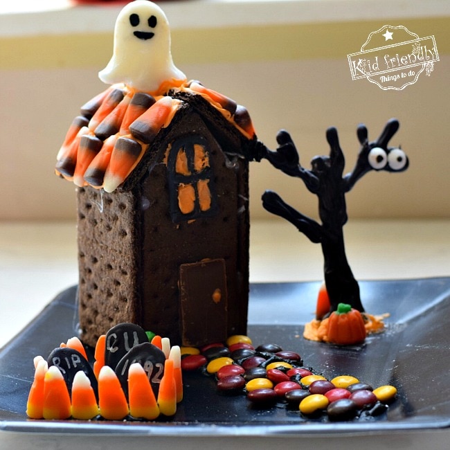 Halloween graham cracker houses are a fun holiday craft for kids.