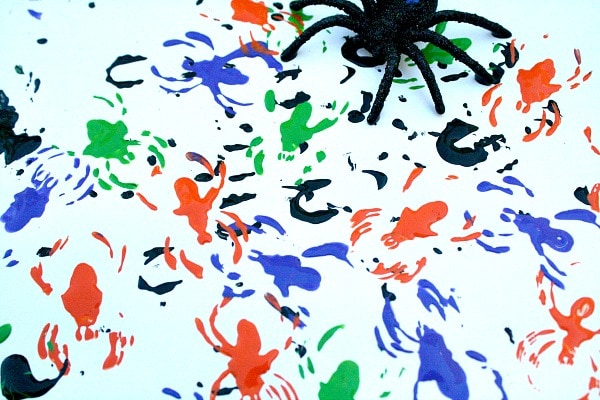 This painting with spiders craft is a fun Halloween party idea.