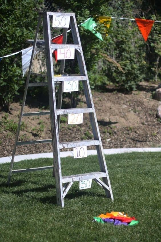 Make a bean bag ladder toss outside