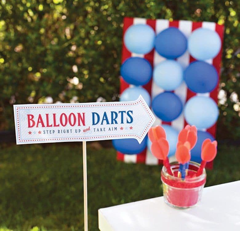 This patriotic, red, white and blue balloon darts game idea makes a fun Fourth of July activity for kids