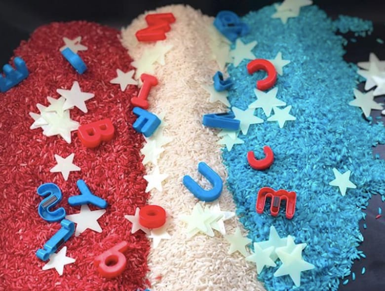 This patriotic, red, white and blue sensory bin makes a fun Fourth of July activity for younger kids