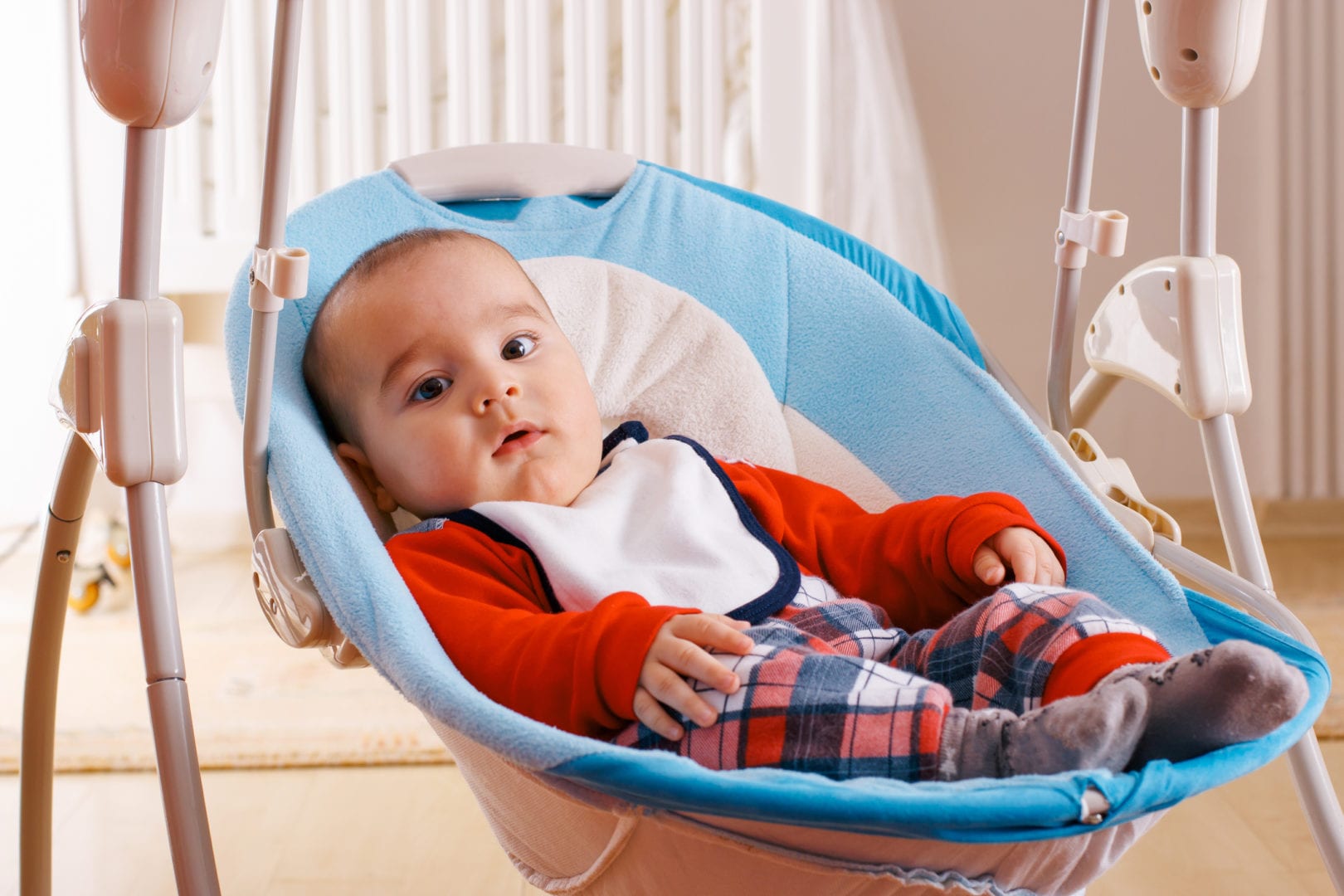 Using a baby swing: Your age, weight and sleep questions answered