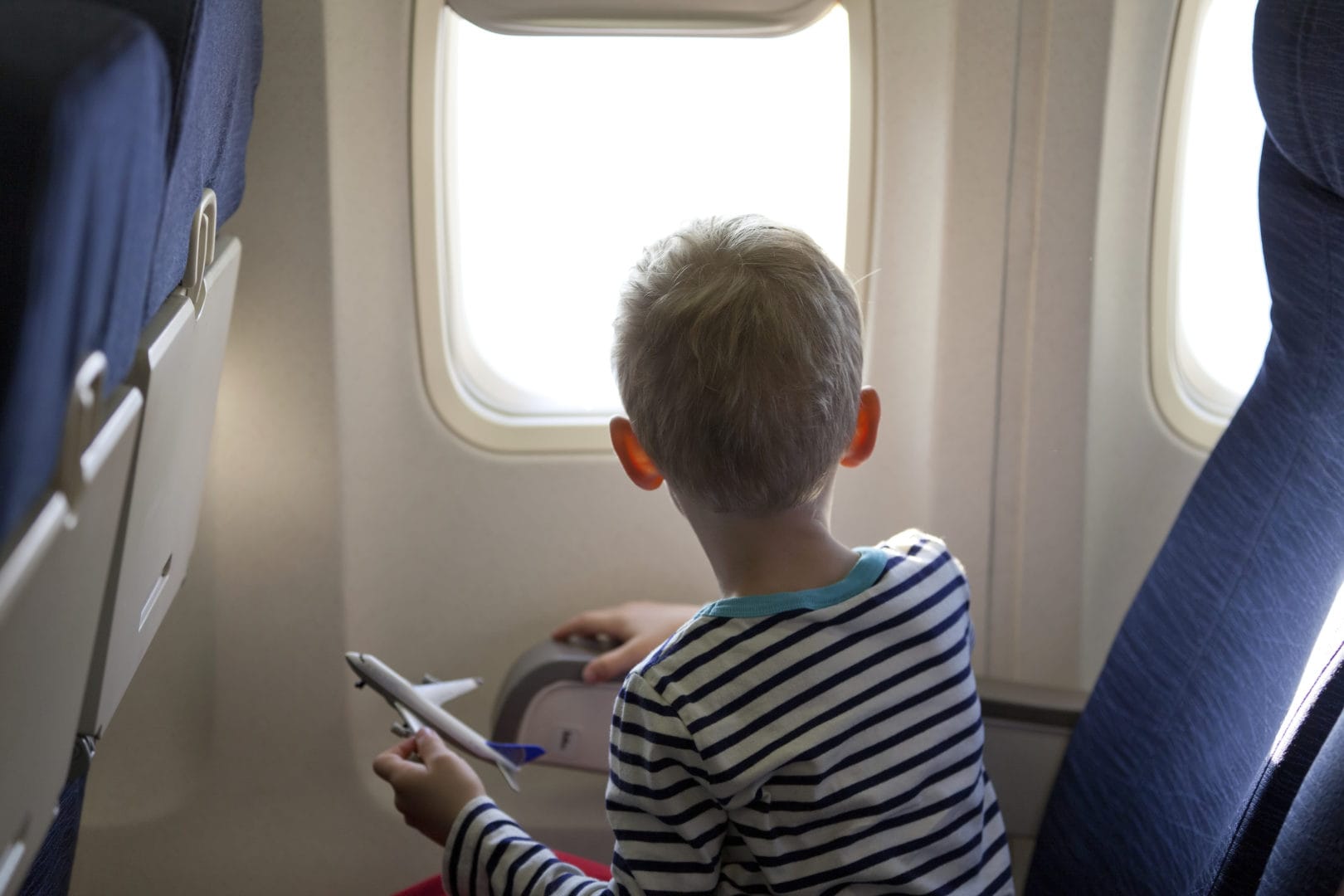 Airplane travel with kids: 20 tips for maintaining your sanity