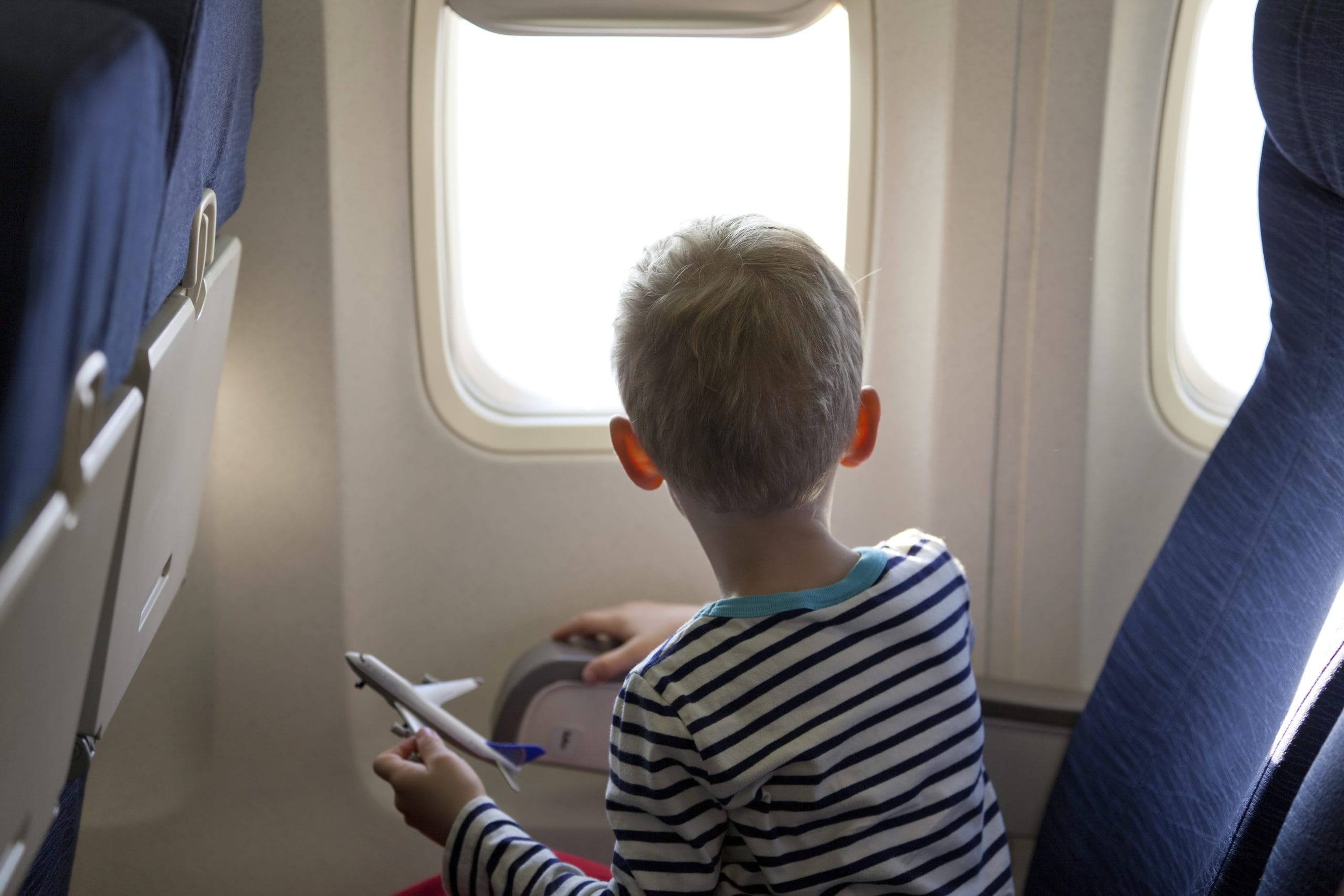 Airplane travel with kids: 20 tips for maintaining your sanity