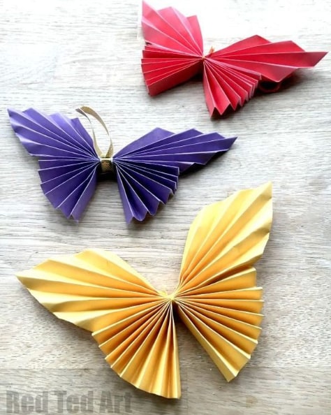 This butterfly paper folding project makes a fun summer craft for kids.