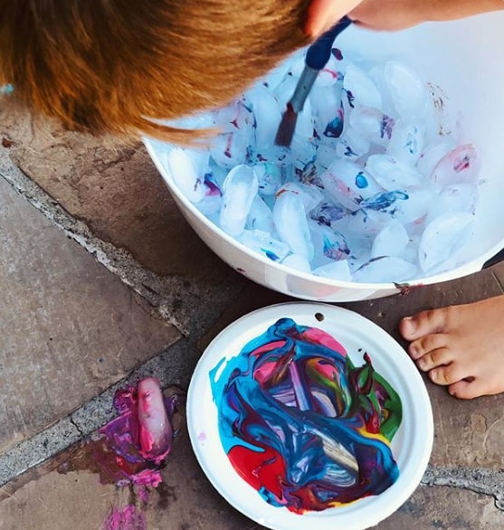 Ice painting is a fun summer craft activity for kids