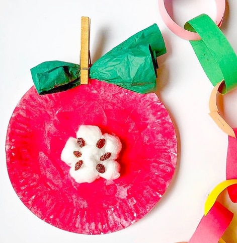 These paper plate apples make a fun summer craft activity for kids