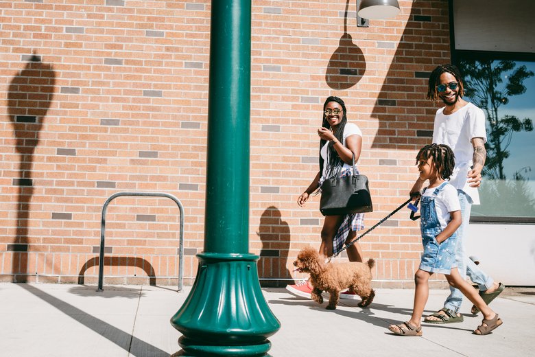 Walking the dog is a fun after-school activity for kids