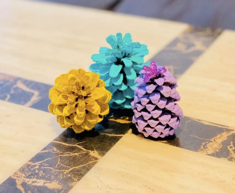 These painted pine cones make a fun after-school activity for kids
