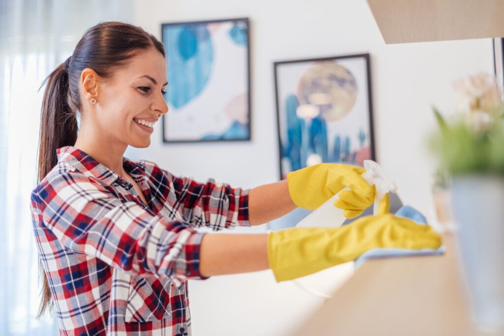 woman making extra cash house cleaning