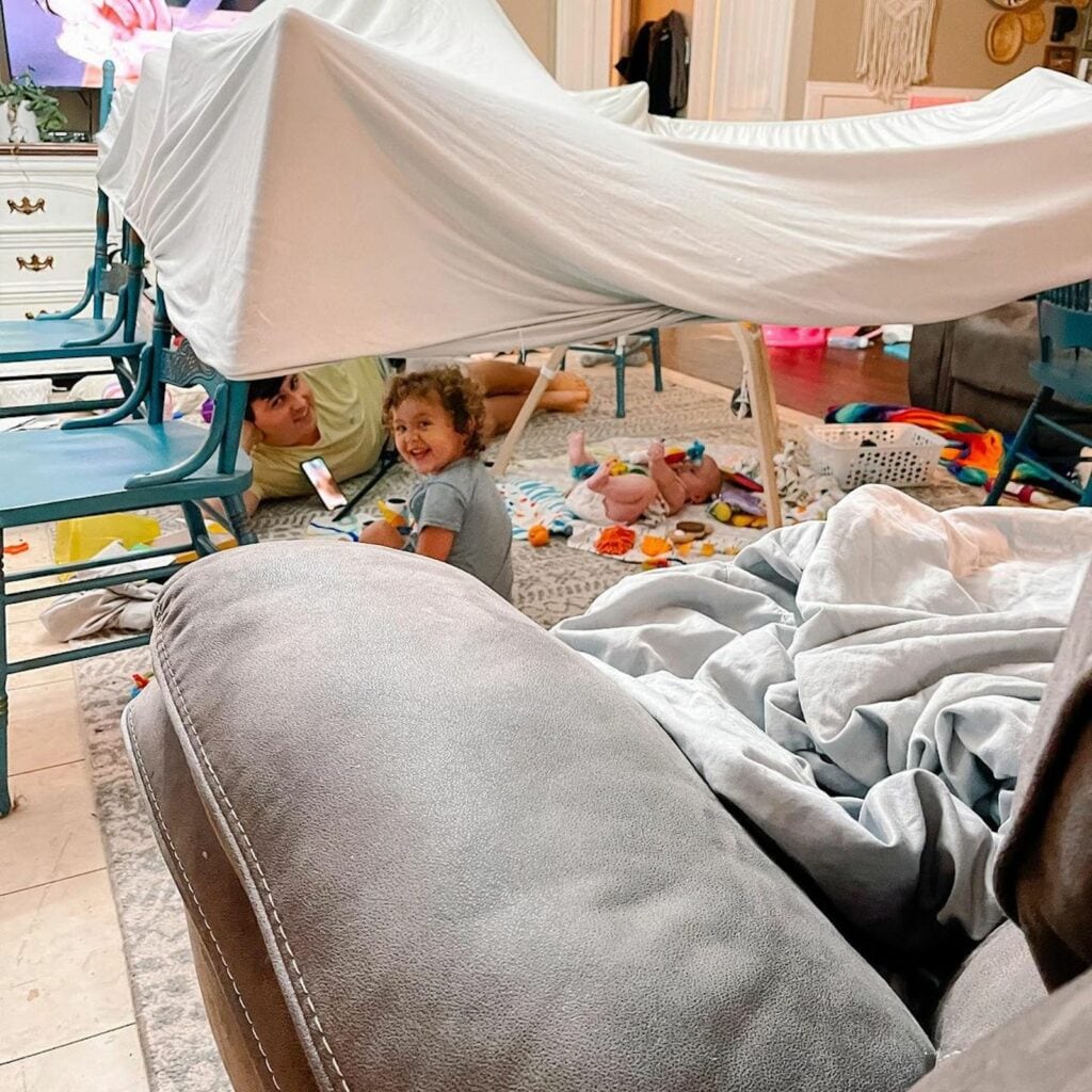 Building a blanket fort is a fun thing to do when bored for kids