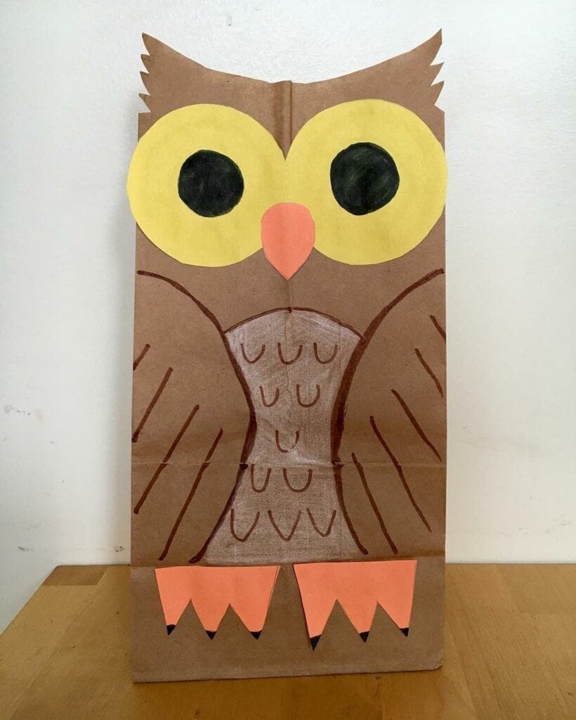 Making this paper bag owl craft is a fun fall activity for kids