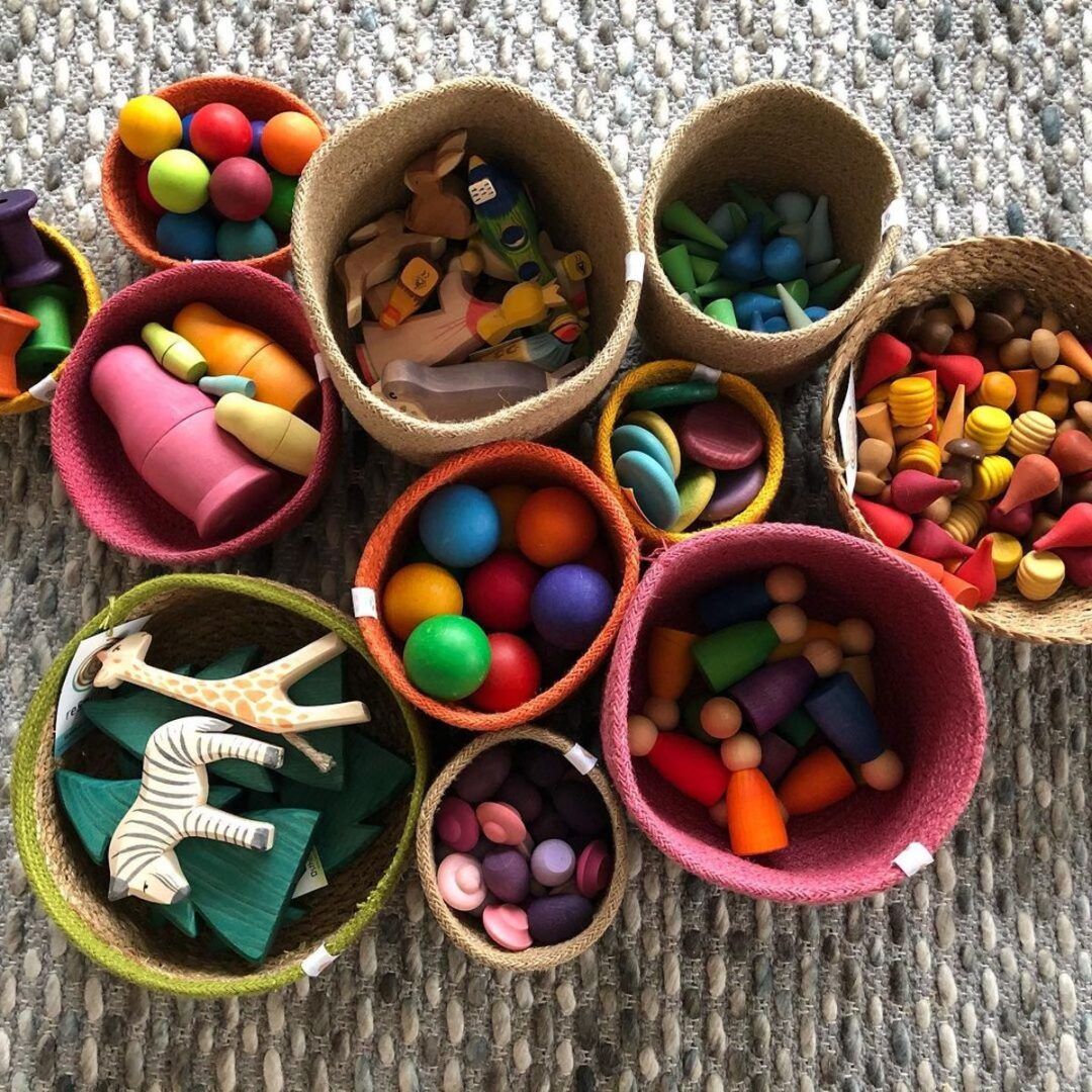 Kids toys organized in pretty baskets