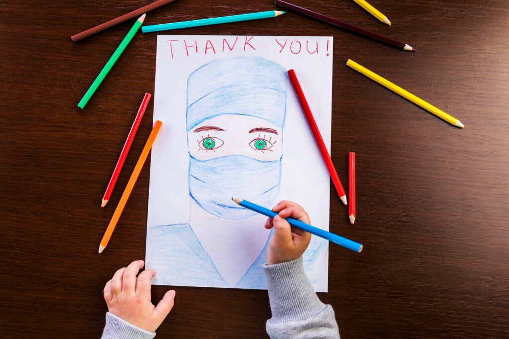 Child draws thank you note for doctors nurses and medical staff during COVID
