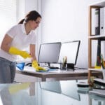 house cleaner tackling office