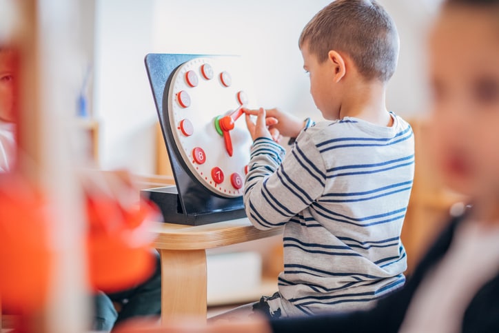 Learning to tell time with a clock is a fun game for 5 year olds