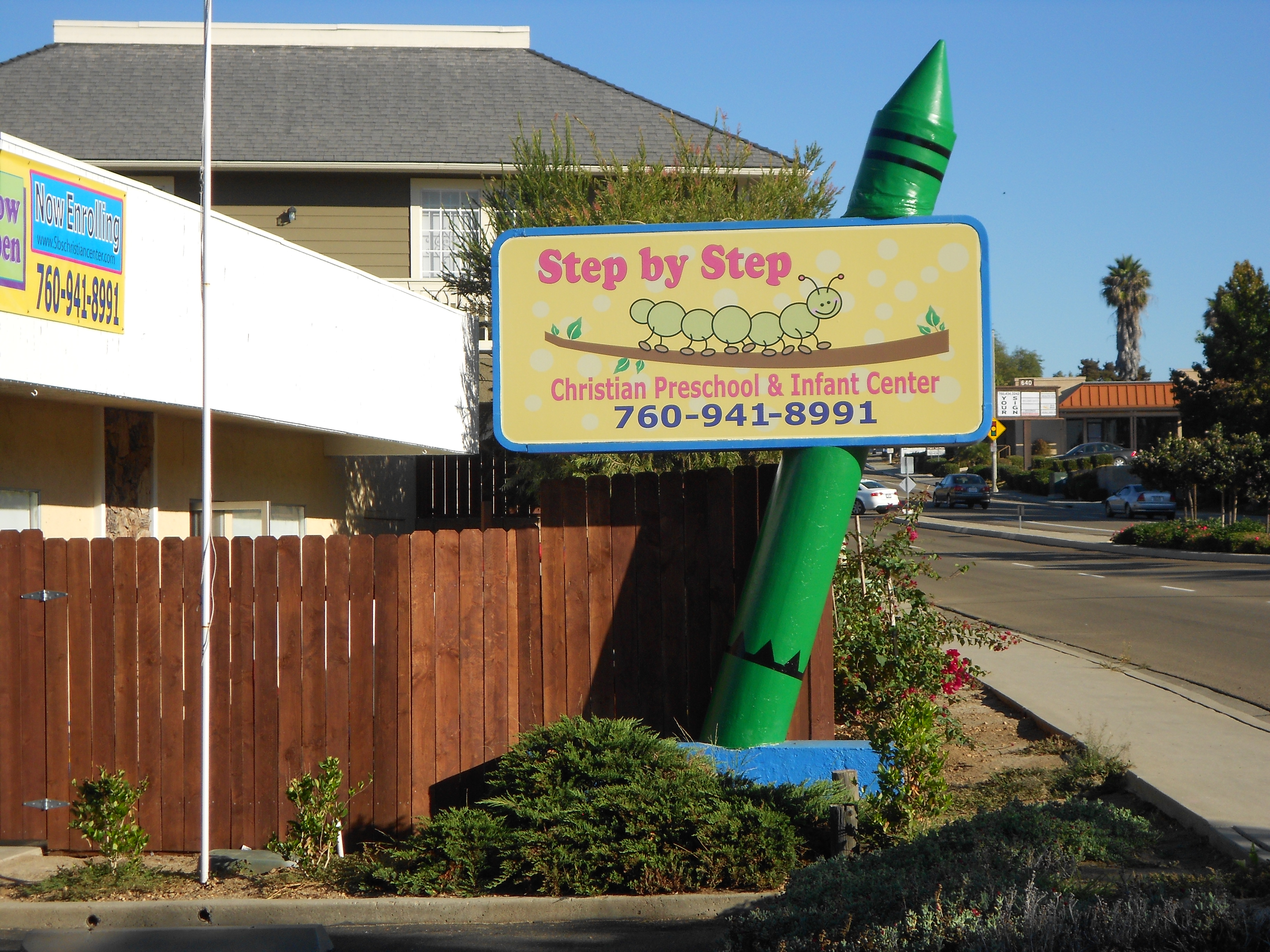 Step By Step Christian Montessori Preschool Logo