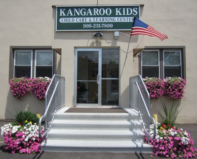 Kangaroo Kids Child Care And Learning Center Logo