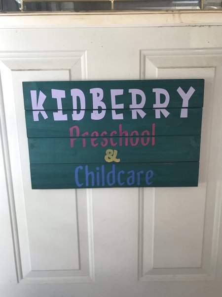 Kidberry Preschool And Child Care Logo