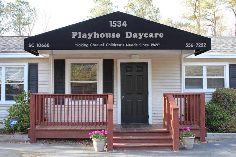 Playhouse Day Care Logo