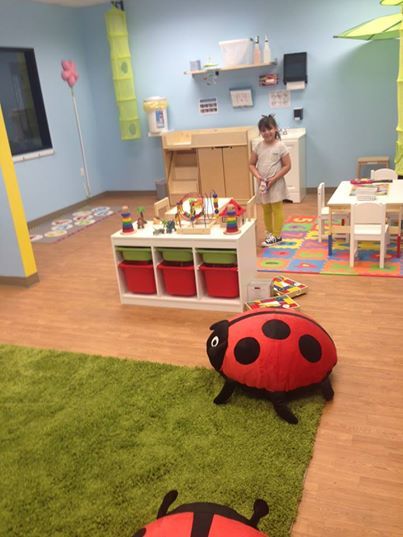 Lady Bug Child Care Logo