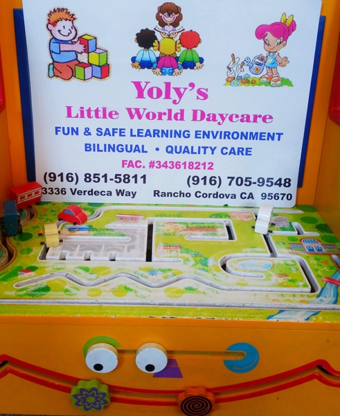 Yoly's Little World Day Care! Logo