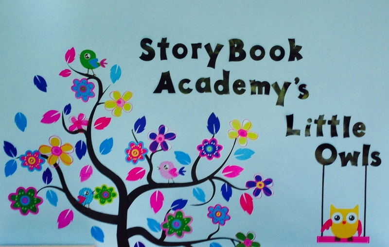 Julie's Daycare/storybook Academy Logo